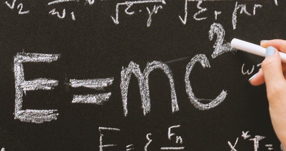Mathematical equations drawn on a chalkboard.